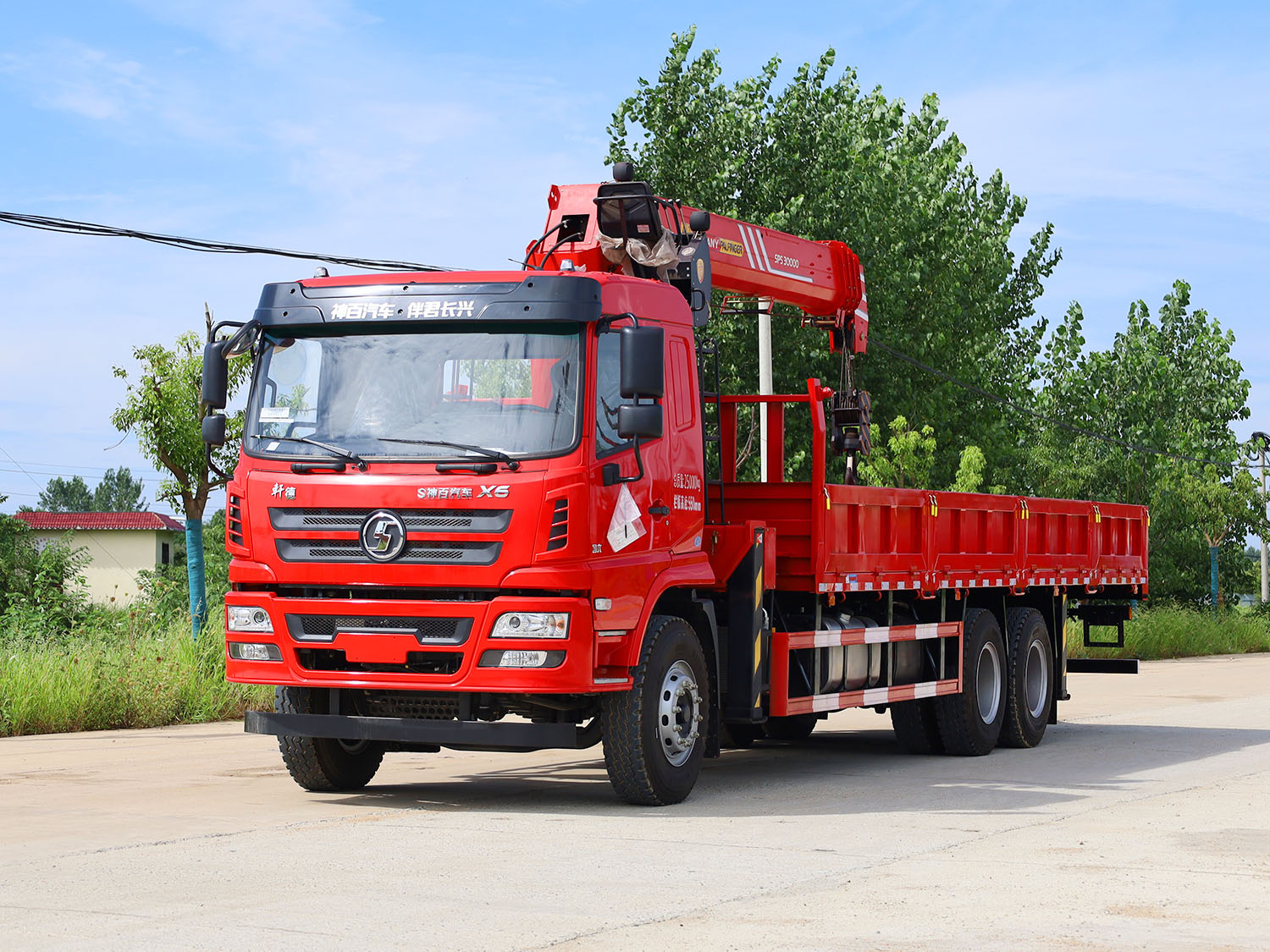 陜汽軒德X6后雙橋上裝三一12噸直臂式吊機